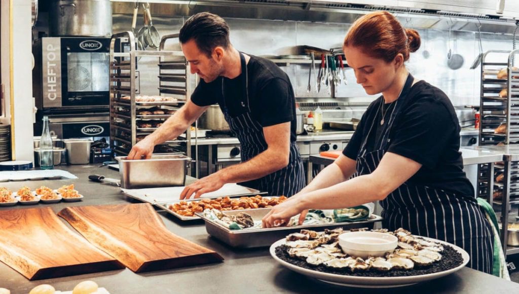 Busy chefs in a restaurant kitchen