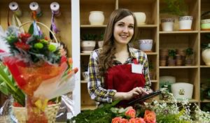 Floor manager working in flower shop